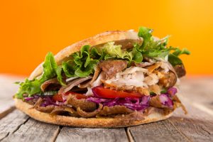 close up of kebab sandwich on wooden background #112712805